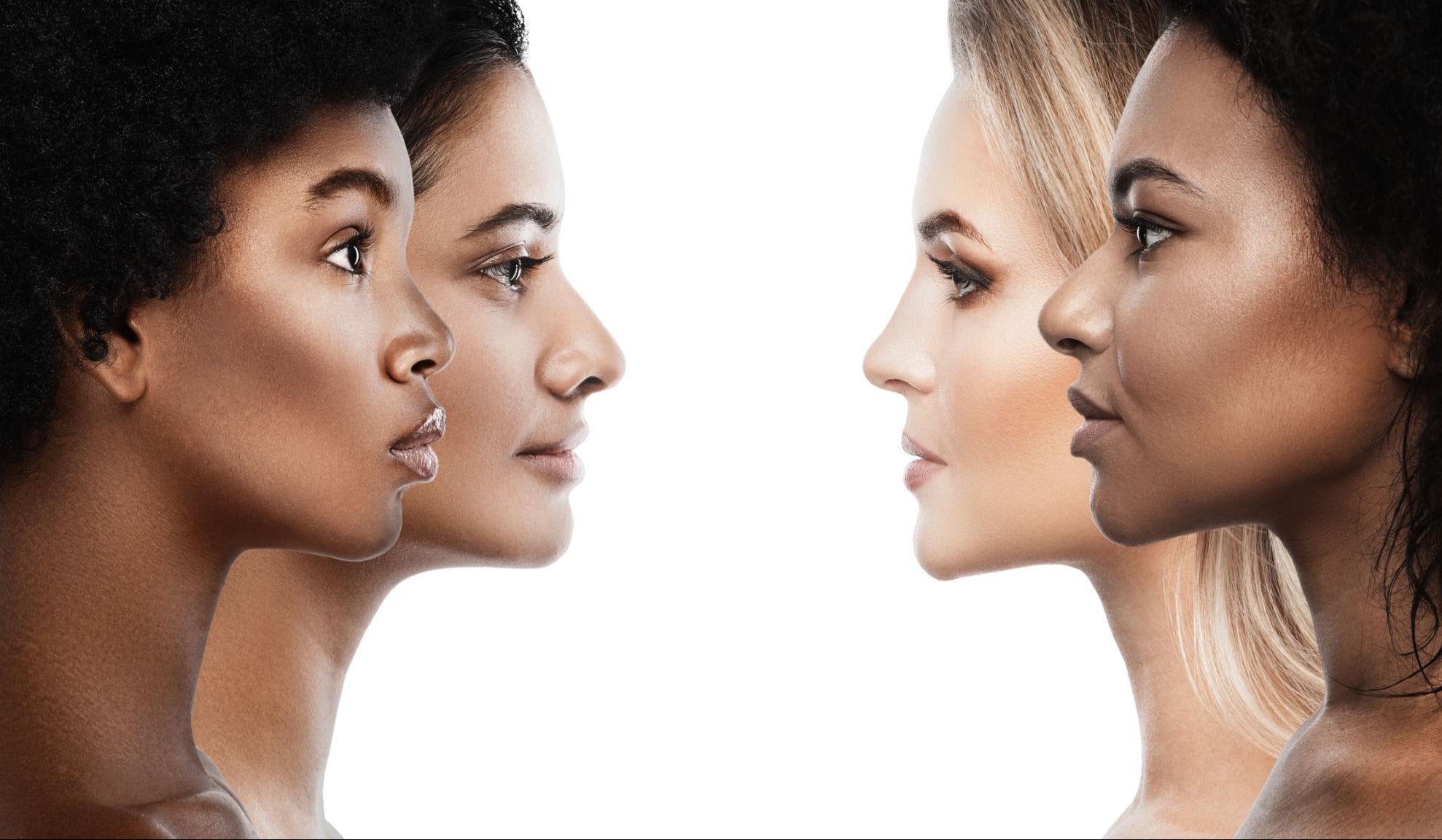 Four women with different skin tones and hairstyles on a white background